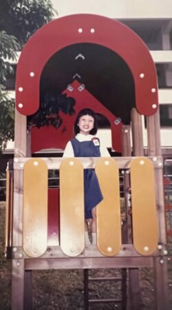 Caption_Sherry at the playground between the old Primary block and the Hall, circa 1980s